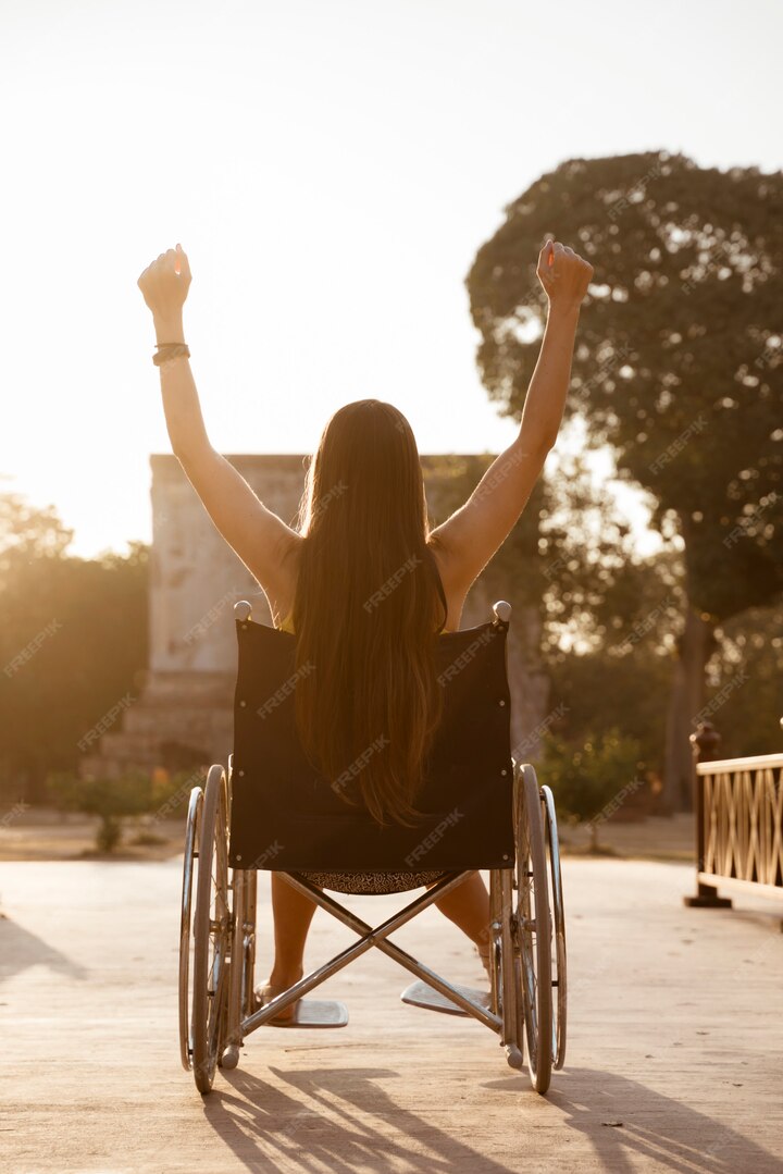 A woman with disability celebrating 