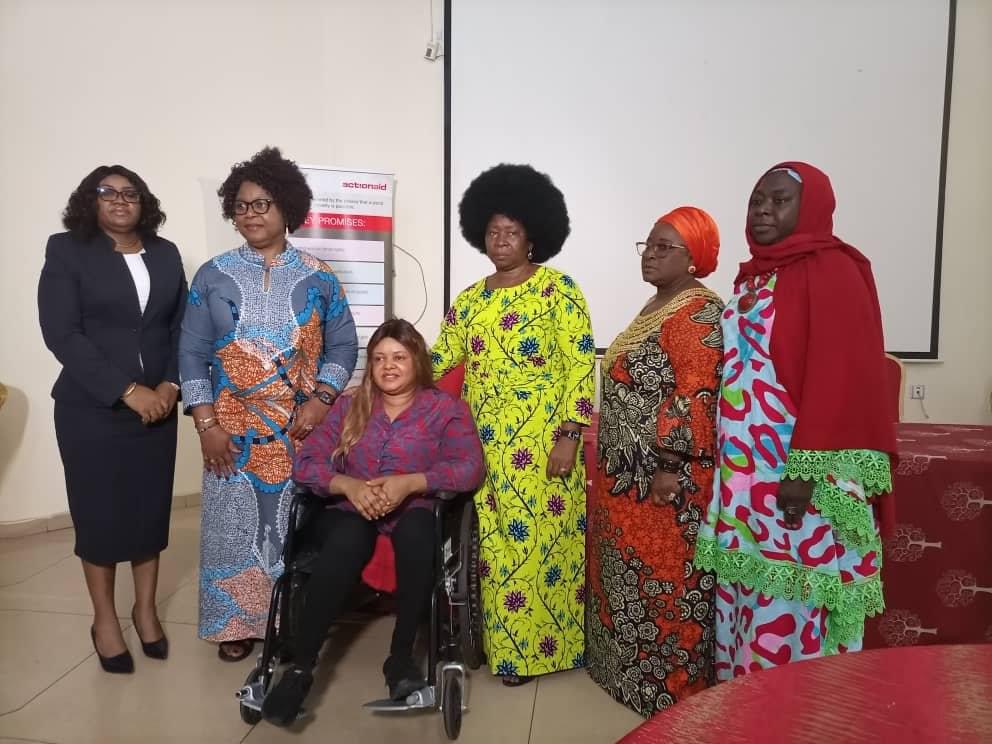 The founder of ISDInitiative with some women from ActionAid