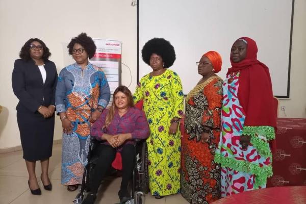 The founder of ISDInitiative with some women from ActionAid